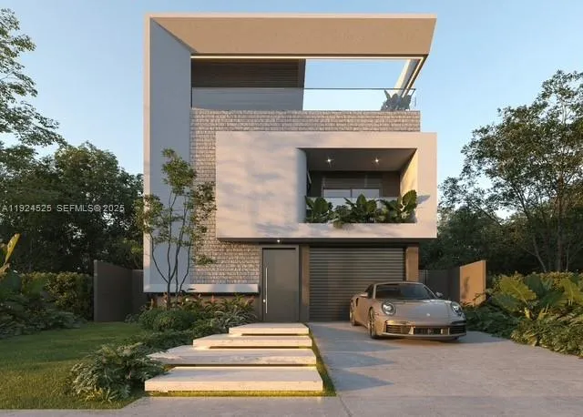 a front view of a house with a garden and plants