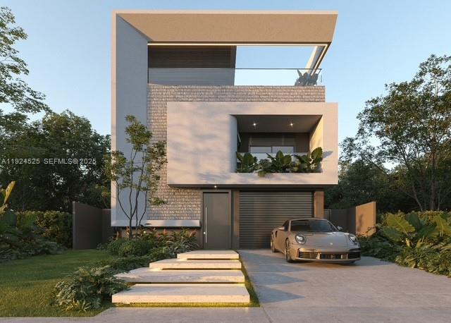 a front view of a house with a garden and plants