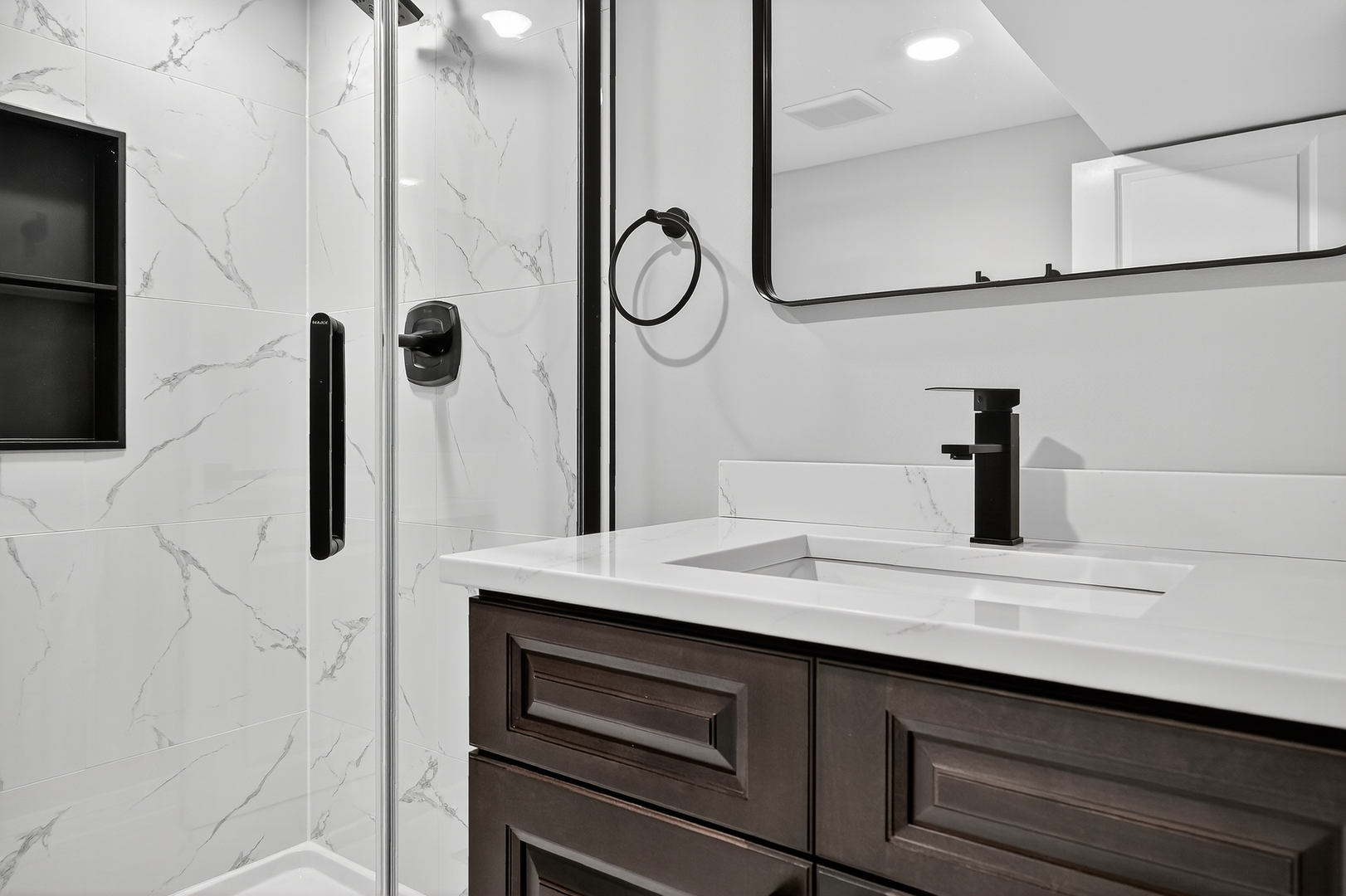 3540 Madison Street Lansing, IL 60438 - Photo 21 of 29 a bathroom with a sink and mirror