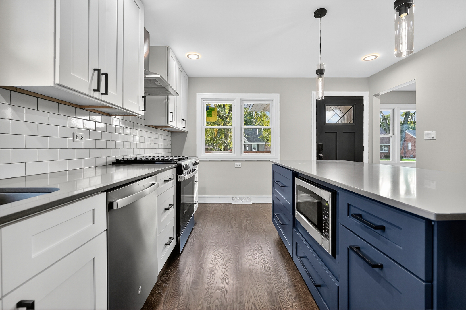 3540 Madison Street Lansing, IL 60438 - Photo 8 of 29 a kitchen with granite countertop a stove and a sink