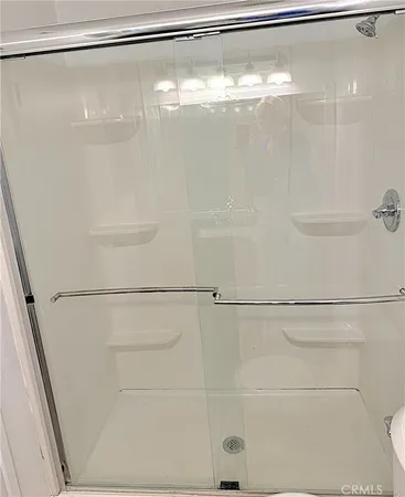 a bathroom with a glass shower