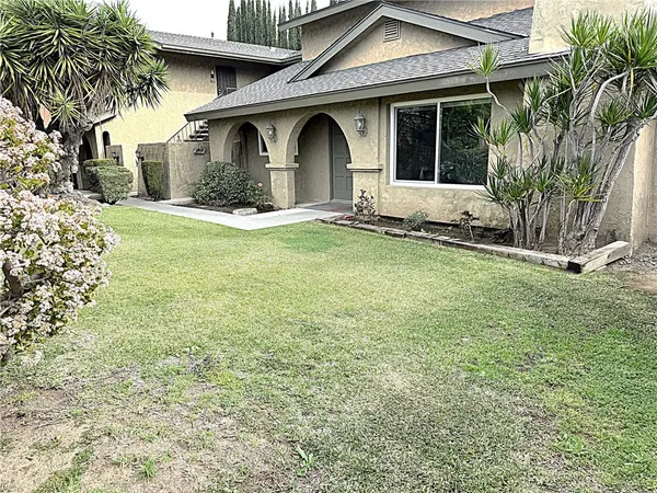 a house view with a outdoor space