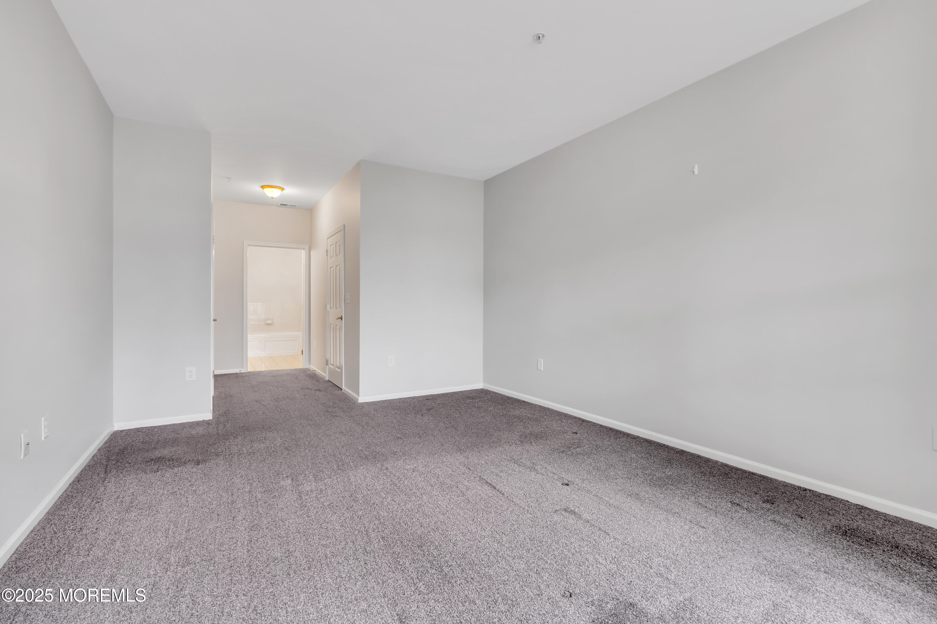 694 St Andrews Place Manalapan, NJ 07726 - Photo 13 of 26 a view of an empty room