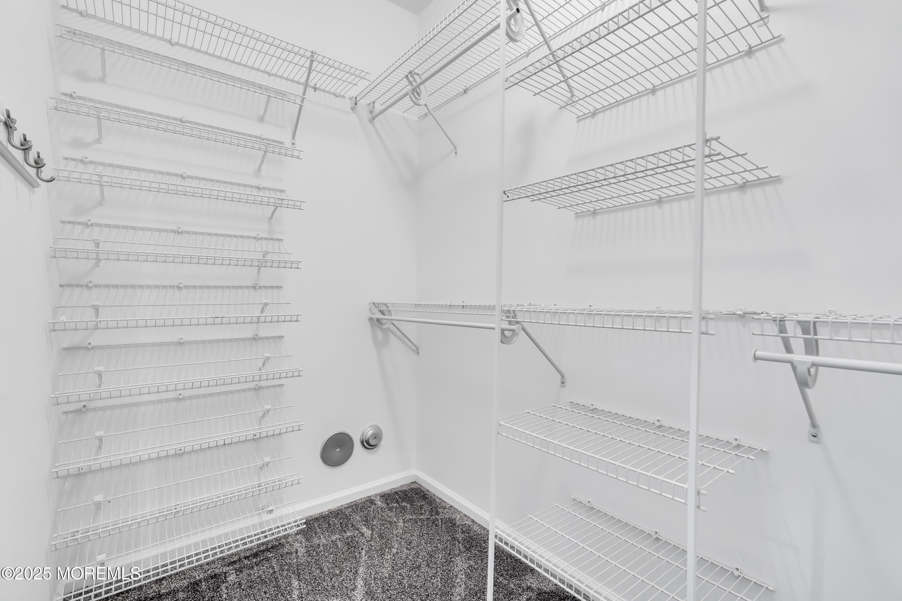 694 St Andrews Place Manalapan, NJ 07726 - Photo 14 of 26 a view of walk in closet