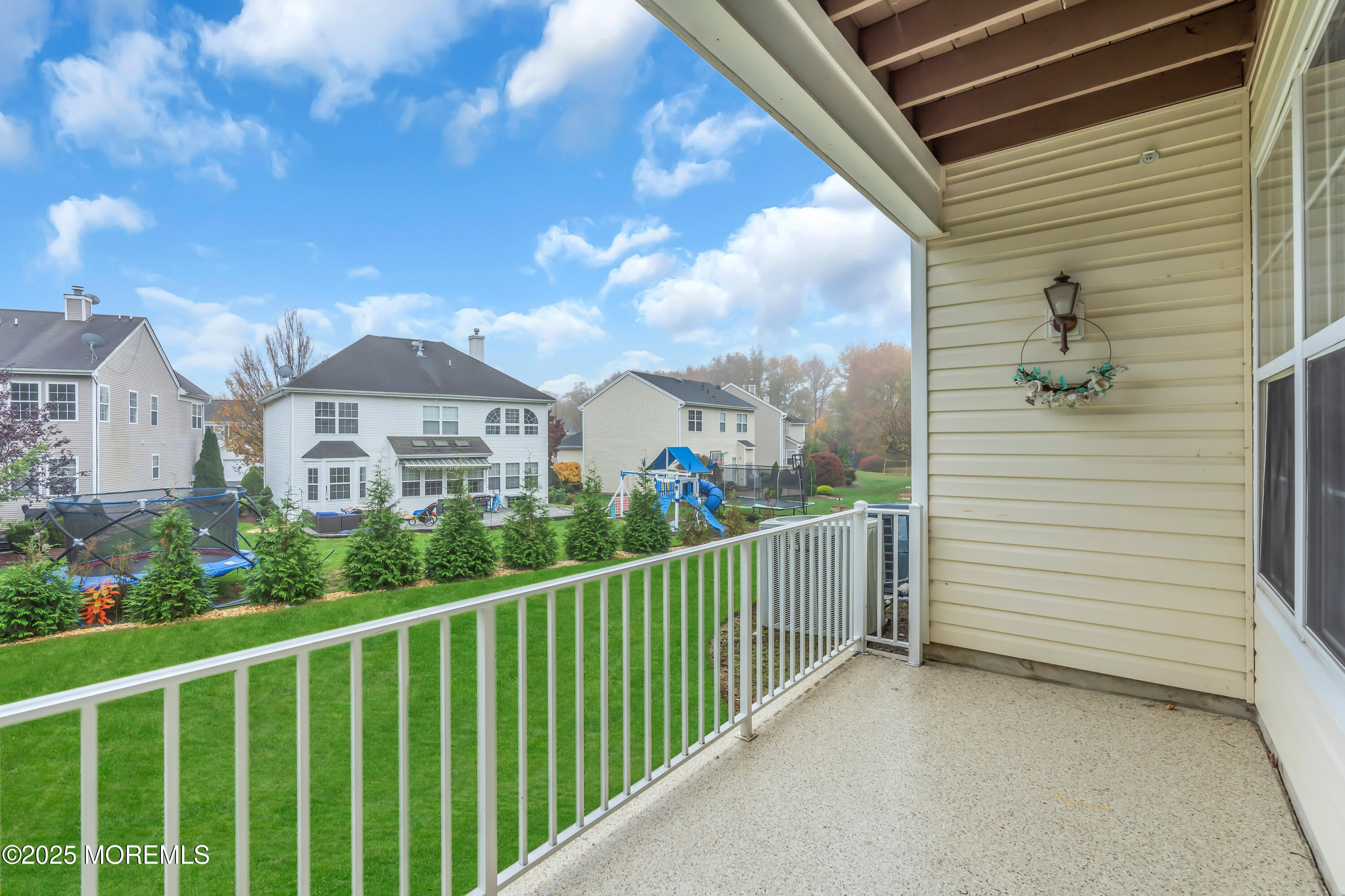694 St Andrews Place Manalapan, NJ 07726 - Photo 25 of 26 a view of a city from a balcony