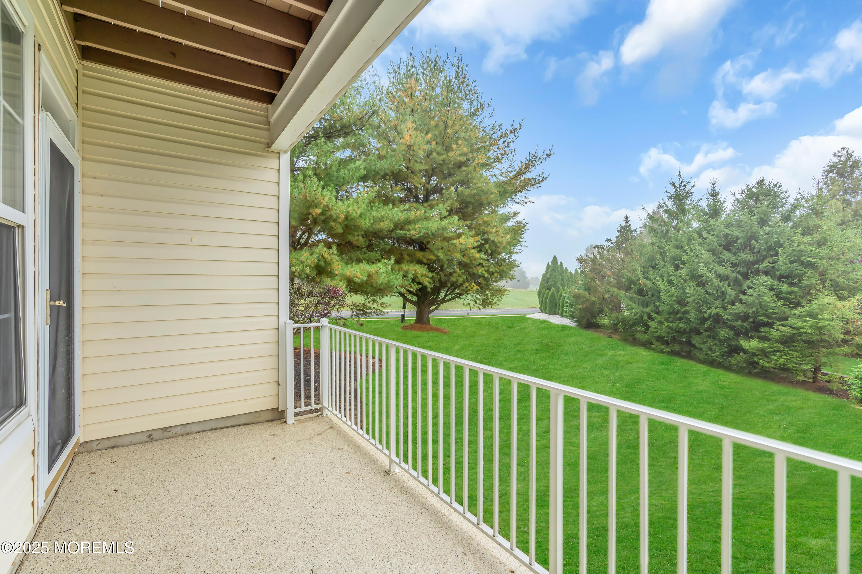 694 St Andrews Place Manalapan, NJ 07726 - Photo 26 of 26 a view of a balcony with an outdoor space