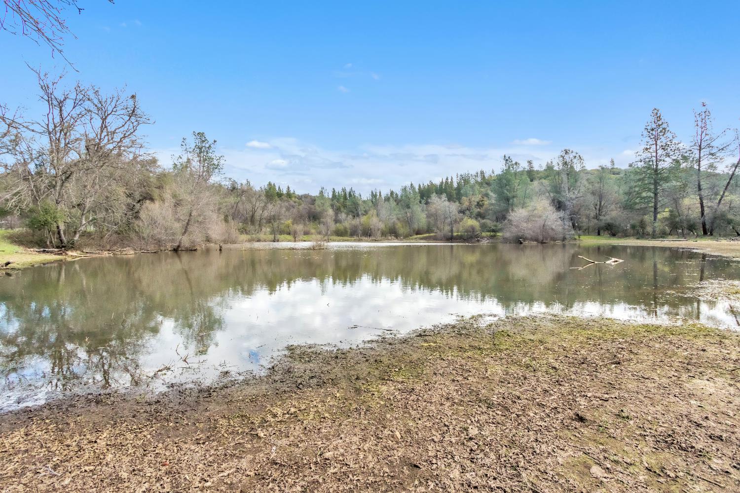 10121 Valley Drive Rough and Ready, CA 95975 - Photo 15 of 44 a view of a lake with a mountain view