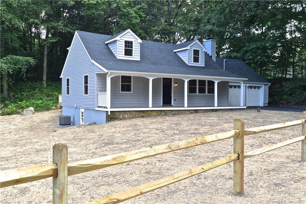 6 Morgan Road Danbury, CT 06811 - Photo 1 of 1 a front view of a house with a yard