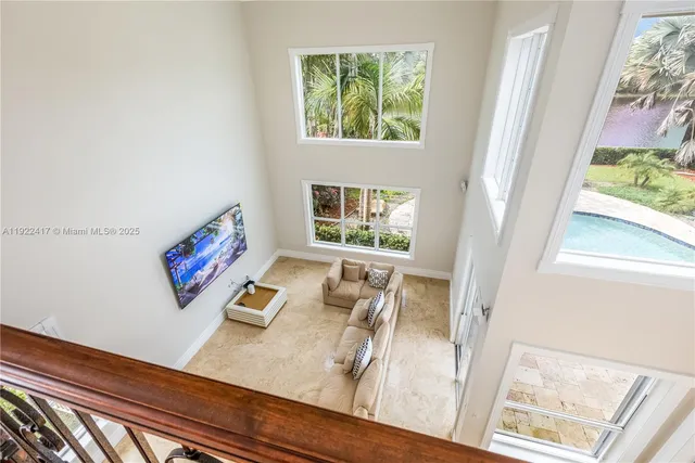 a view of a living room and window