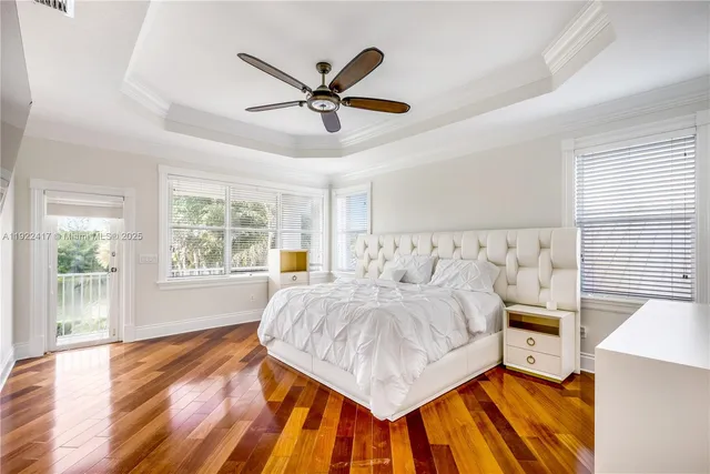 a bed room with a bed and a window