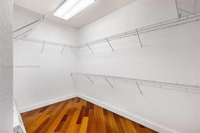 a view of a room with racks on the wall