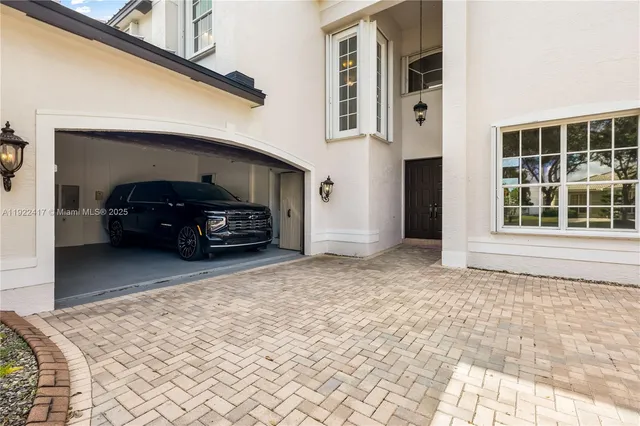 a car parked in front of a house