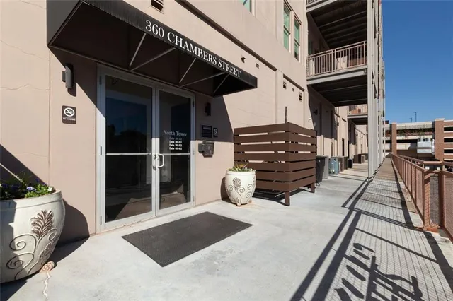 a bedroom with a bed and a walk in closet