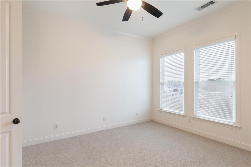 360 Chambers Street, Unit 208 Woodstock, GA 30188 - Photo 28 of 46 an empty room with a window