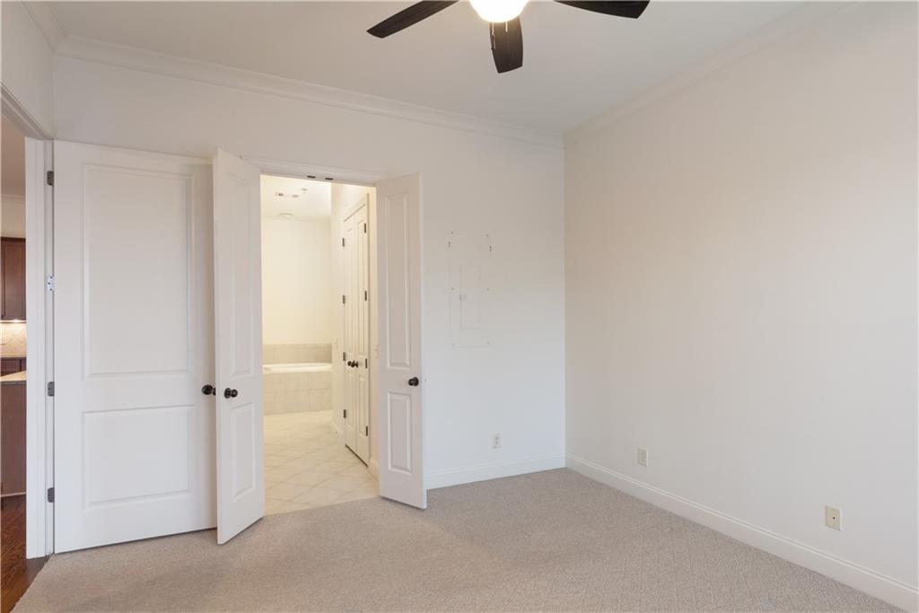 360 Chambers Street, Unit 208 Woodstock, GA 30188 - Photo 29 of 46 wooden floor in an empty room