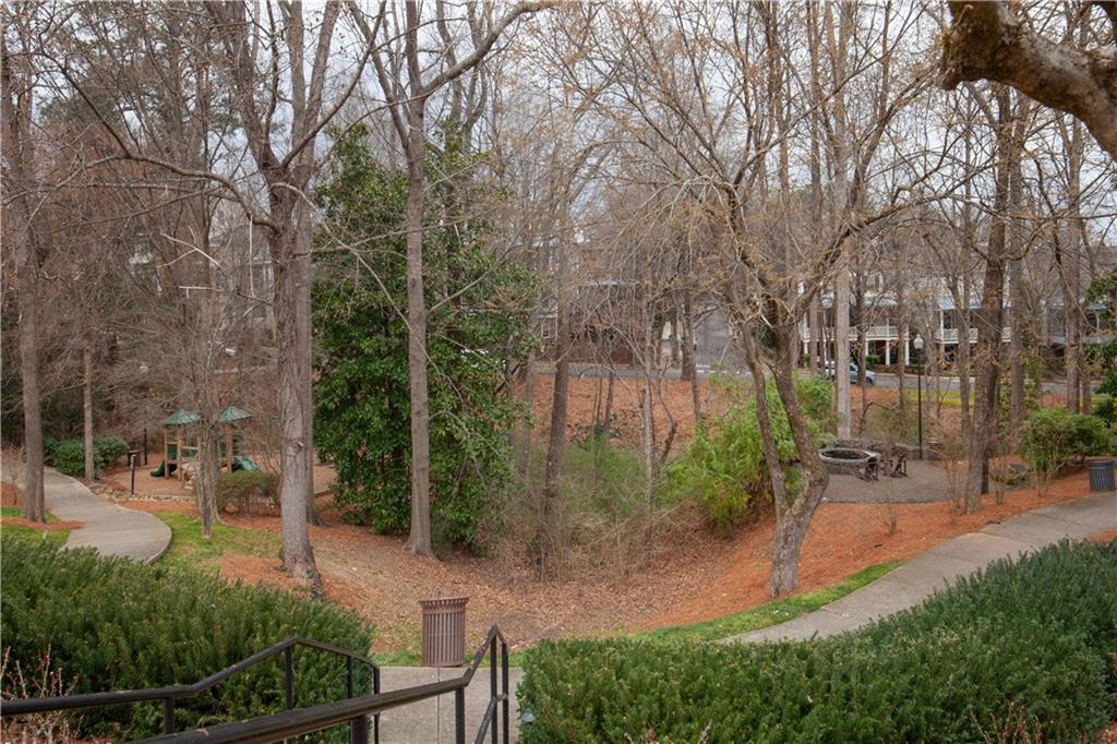 360 Chambers Street, Unit 208 Woodstock, GA 30188 - Photo 45 of 46 a view of a park with large trees