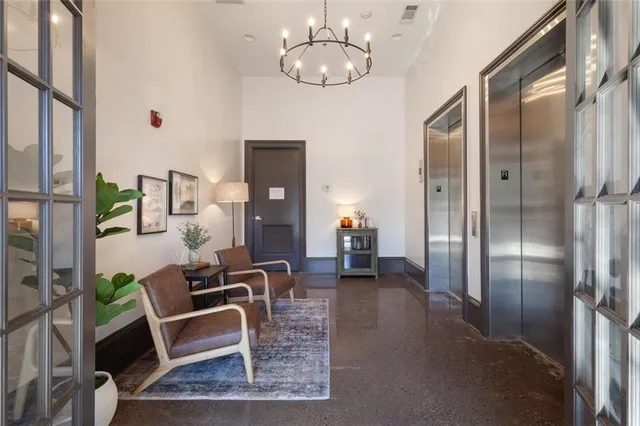 a view of a livingroom with furniture and windows