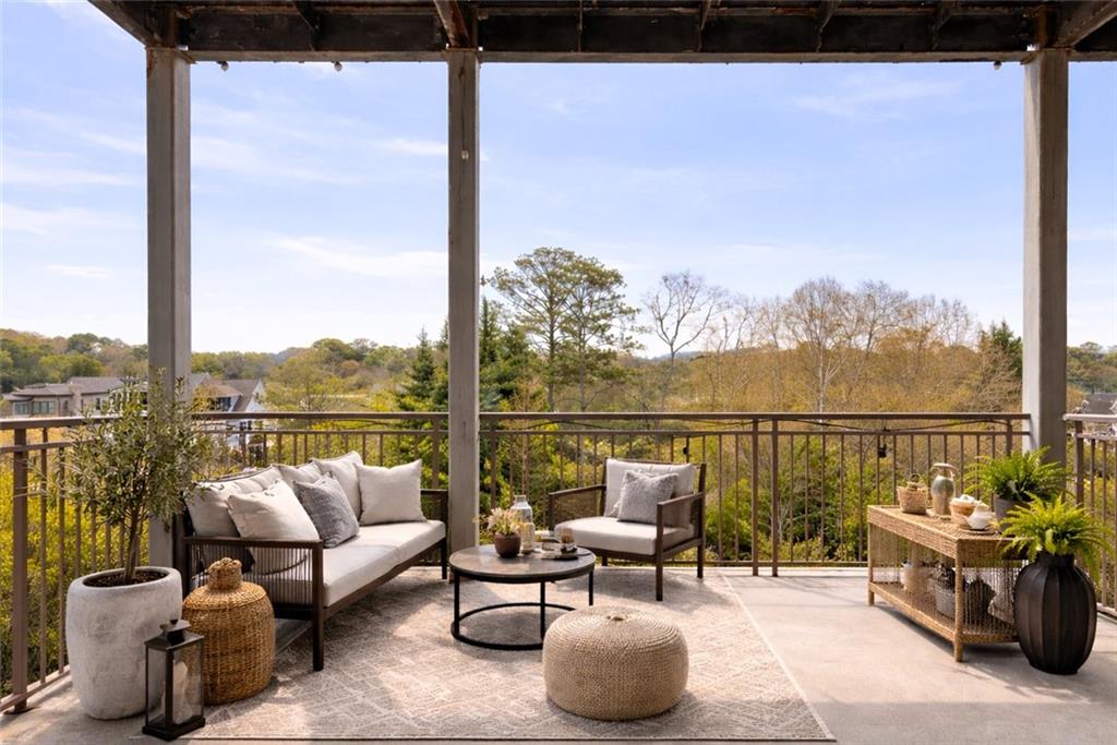 360 Chambers Street, Unit 208 Woodstock, GA 30188 - Photo 5 of 46 a view of a terrace with couches