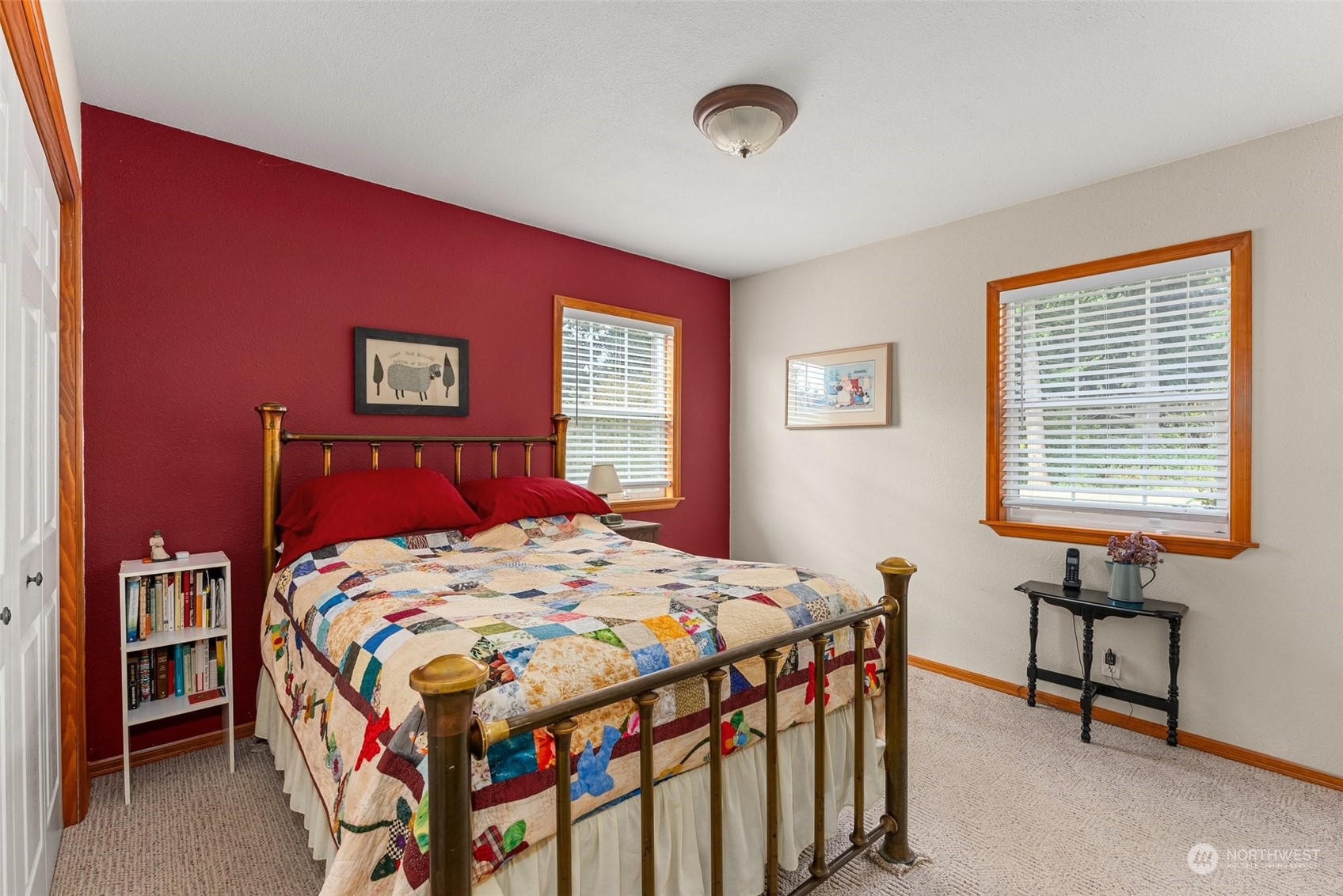 158 Hawkins Road Winlock, WA 98596 - Photo 17 of 28 a bedroom that has a bed and a table in it