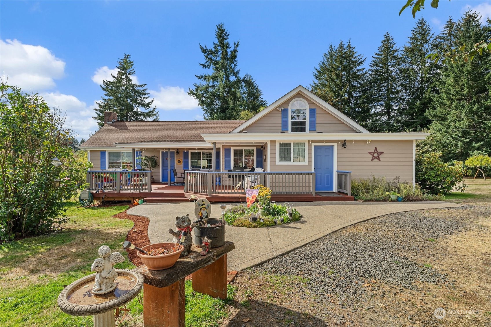 158 Hawkins Road Winlock, WA 98596 - Photo 23 of 28 a front view of a house with garden and patio