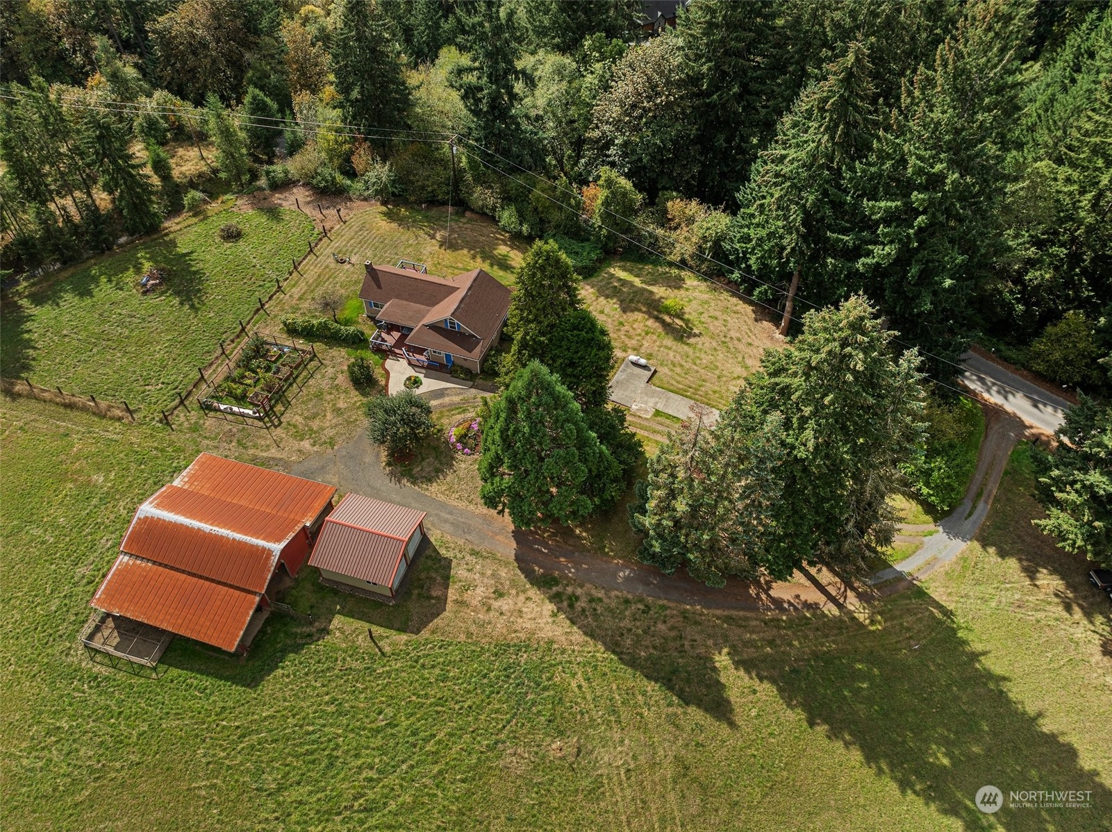 158 Hawkins Road Winlock, WA 98596 - Photo 26 of 28 an aerial view of a house with pool yard swimming pool and outdoor seating