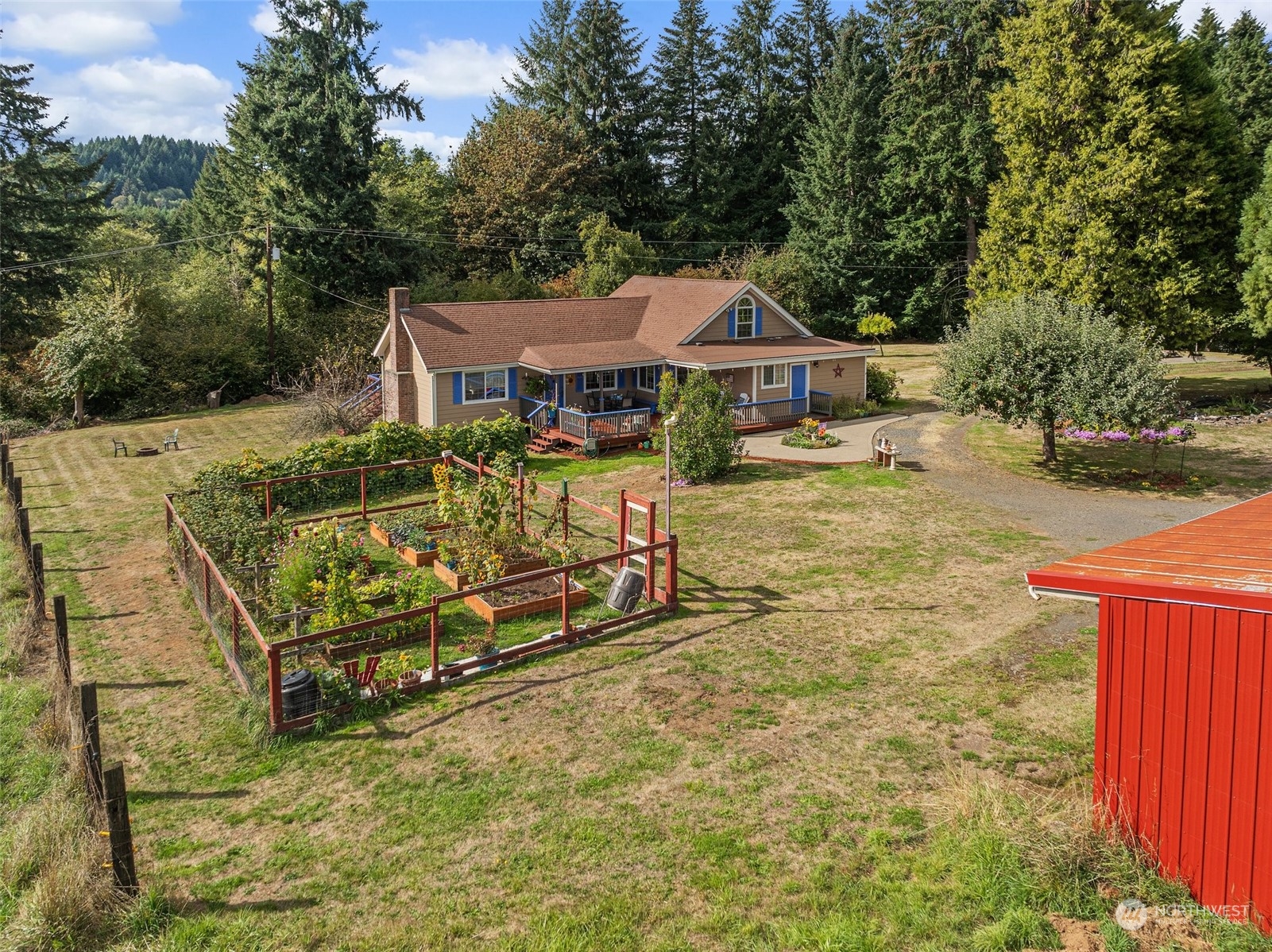 158 Hawkins Road Winlock, WA 98596 - Photo 27 of 28 a view of a house with wooden fence
