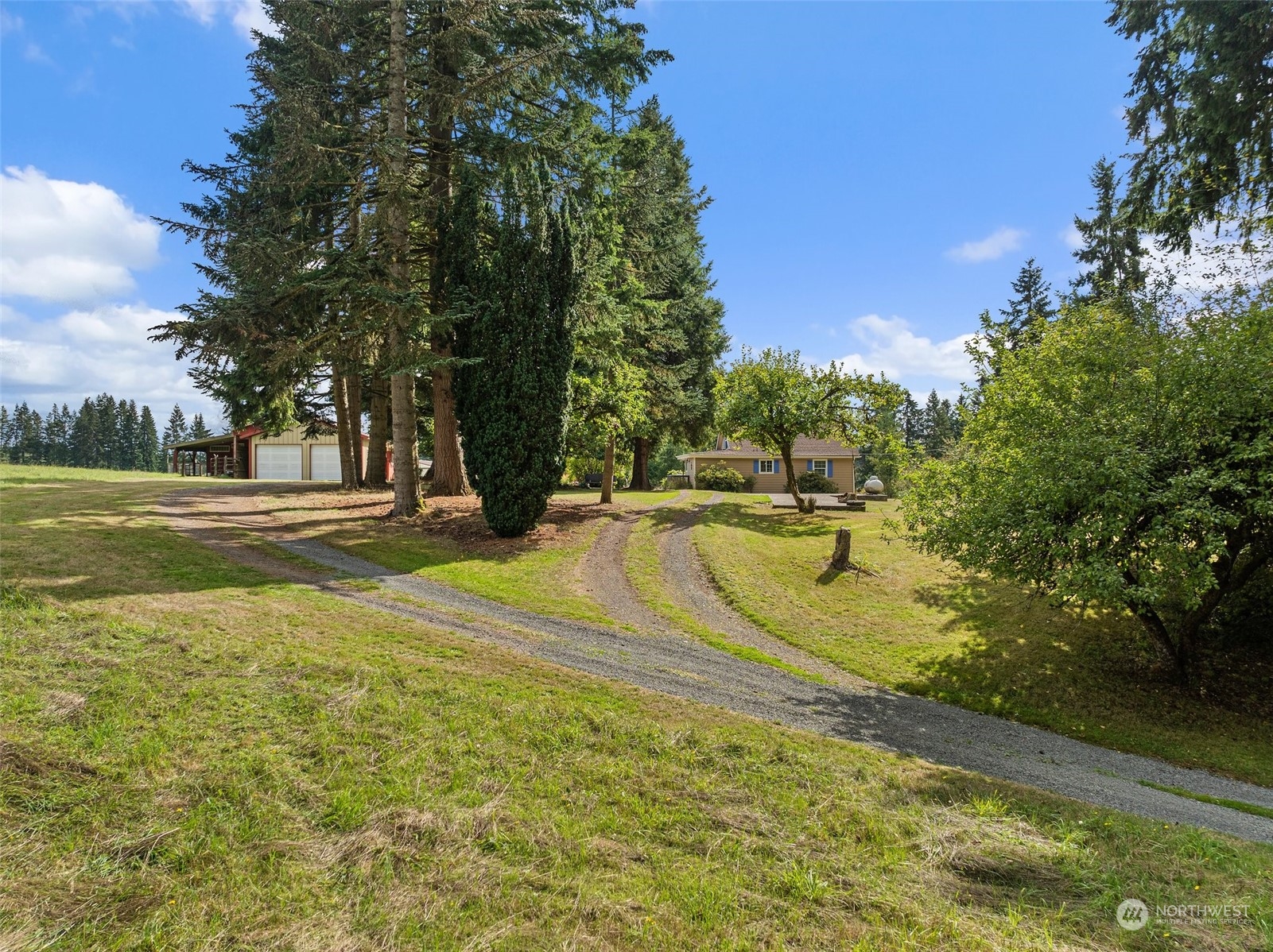 158 Hawkins Road Winlock, WA 98596 - Photo 28 of 28 a view of a swimming pool with an outdoor space and seating area