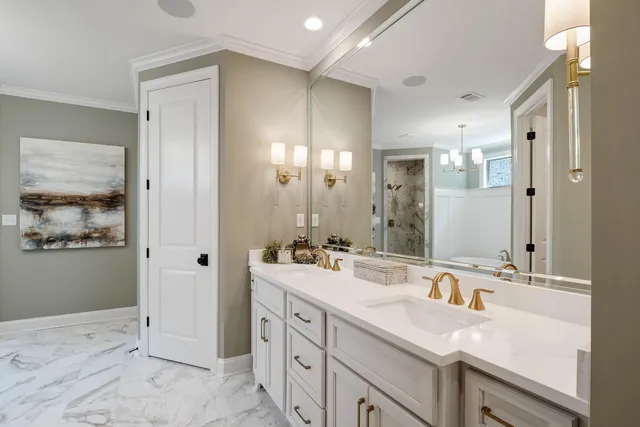 a bathroom with a bathtub and shower