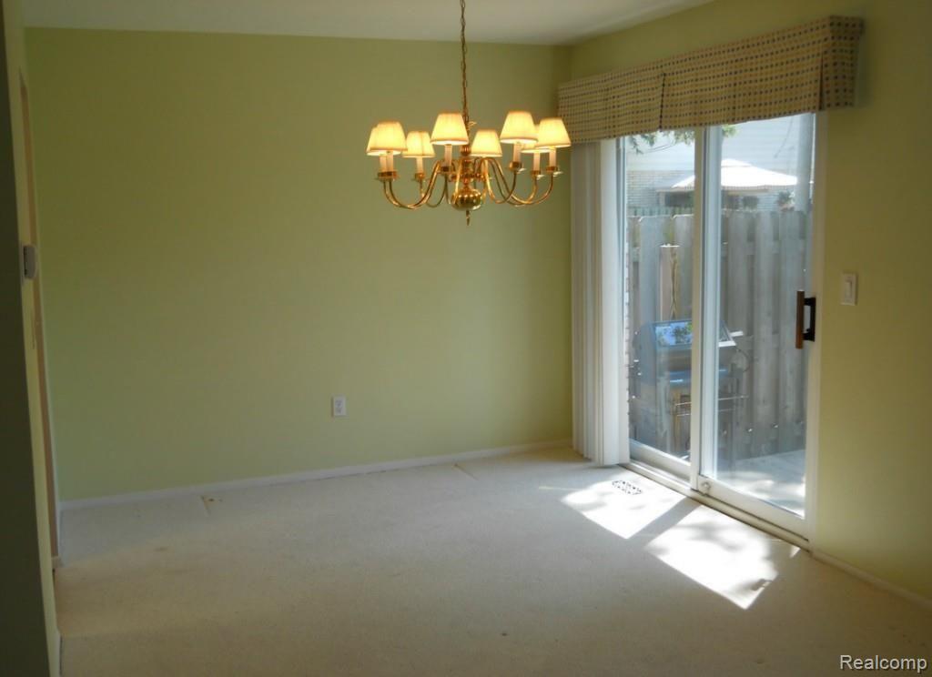 68 Stratford Lane, Unit 13 Rochester, MI 48309 - Photo 4 of 20 Dining Room Walkout To Deck