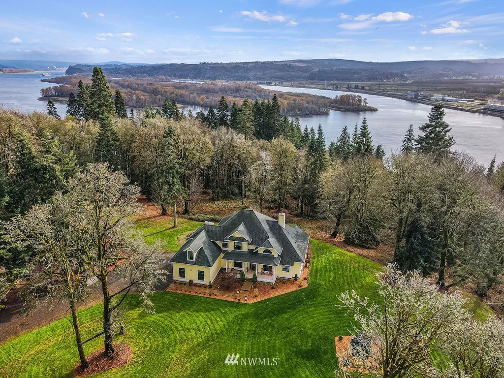 212 Whitewater Road Longview, WA 98632 - Photo 32 of 39 an aerial view of a house with a garden and a yard