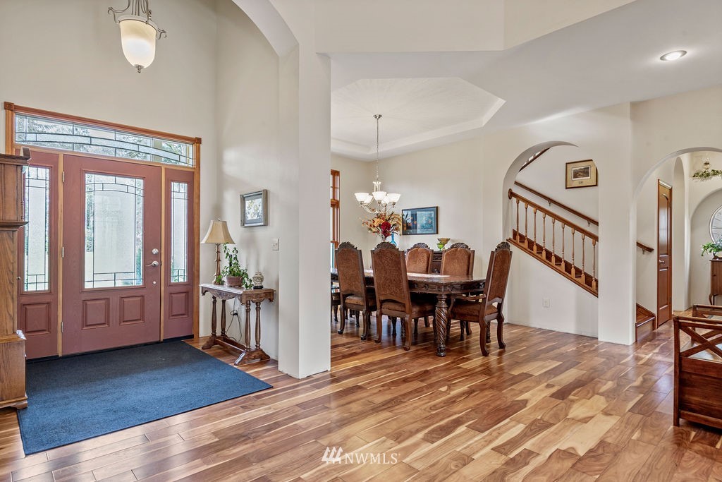 212 Whitewater Road Longview, WA 98632 - Photo 5 of 39 a view of a dining room with furniture and wooden floor