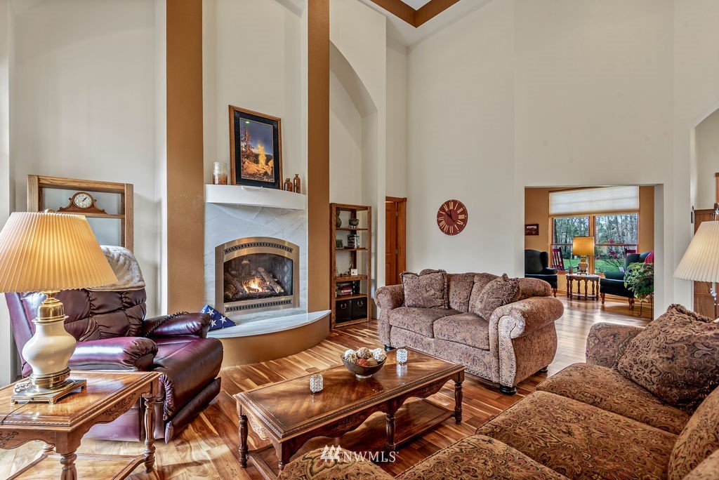 212 Whitewater Road Longview, WA 98632 - Photo 7 of 39 a living room with furniture and a fireplace