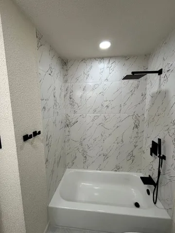 a bathroom with a sink and vanity
