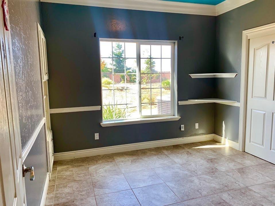21196 Steward Road Madera, CA 93638 - Photo 22 of 39 a view of an empty room with a window