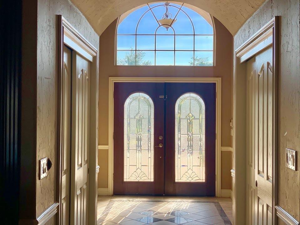 21196 Steward Road Madera, CA 93638 - Photo 29 of 39 a view of an entryway door with a hallway