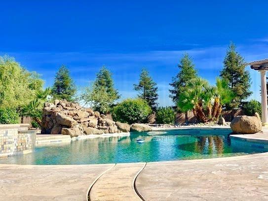 21196 Steward Road Madera, CA 93638 - Photo 5 of 39 a view of a house with a yard