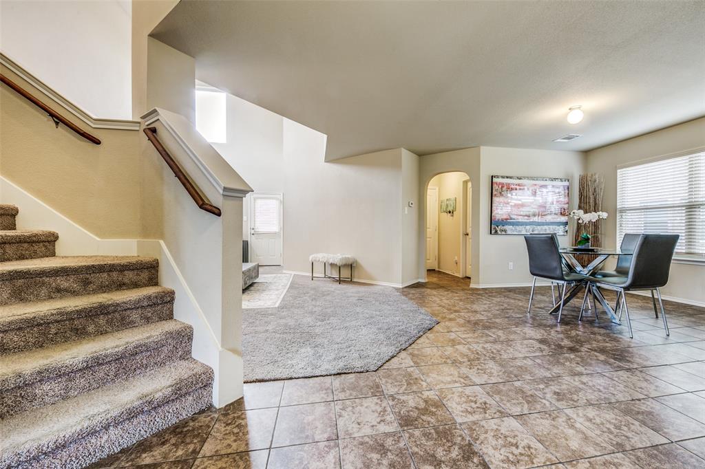 1774 Pioneer Way Lancaster, TX 75146 - Photo 11 of 23 a view of entryway and kitchen