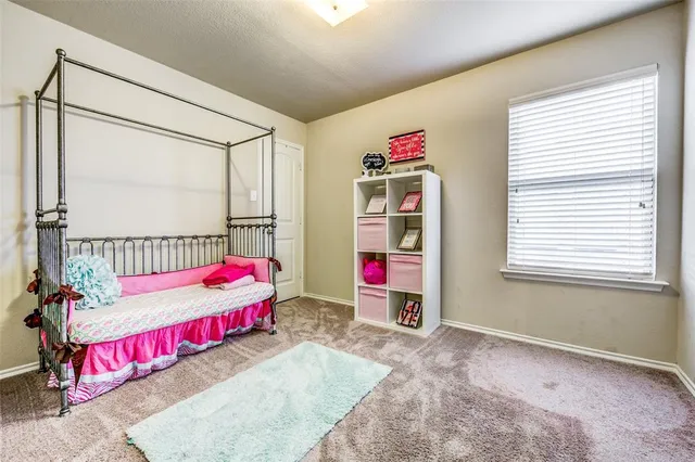 a living room with a couch and a table