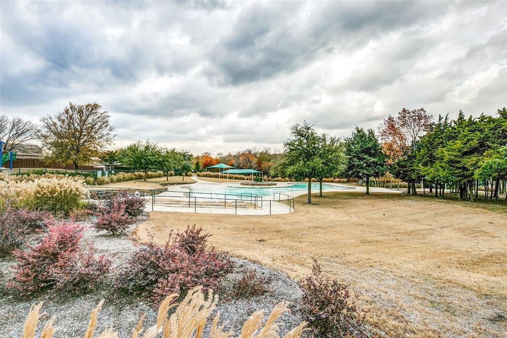 1774 Pioneer Way Lancaster, TX 75146 - Photo 23 of 23 a view of a lake with a yard