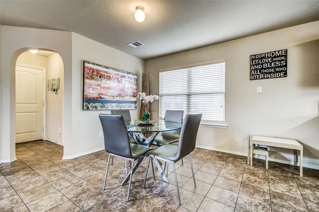 a workspace with furniture and a window