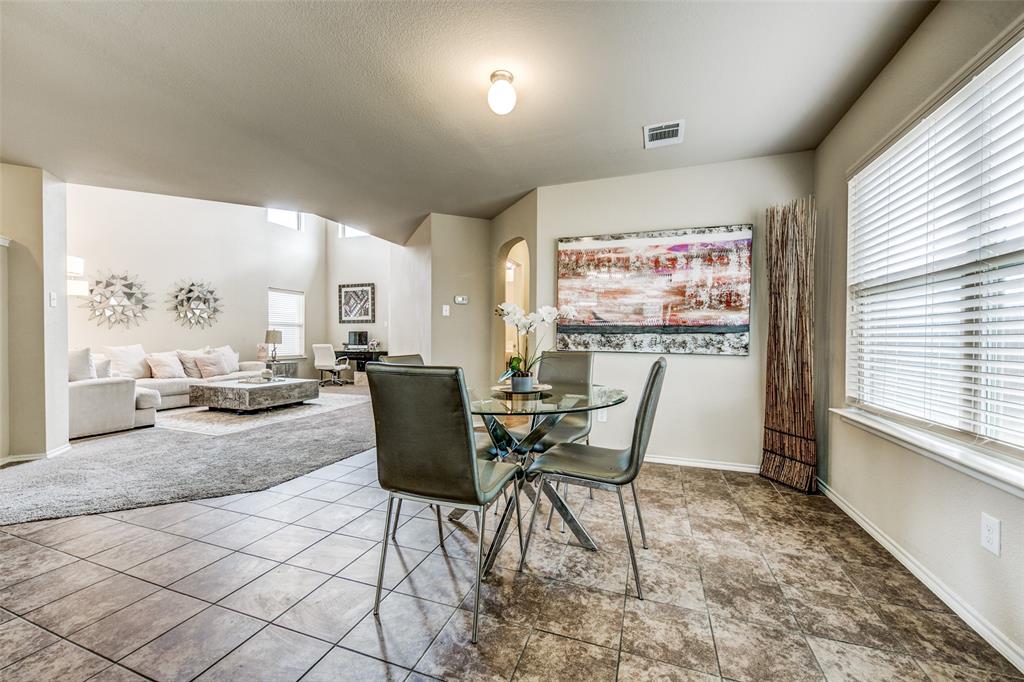 1774 Pioneer Way Lancaster, TX 75146 - Photo 10 of 23 a view of a livingroom with furniture and a window