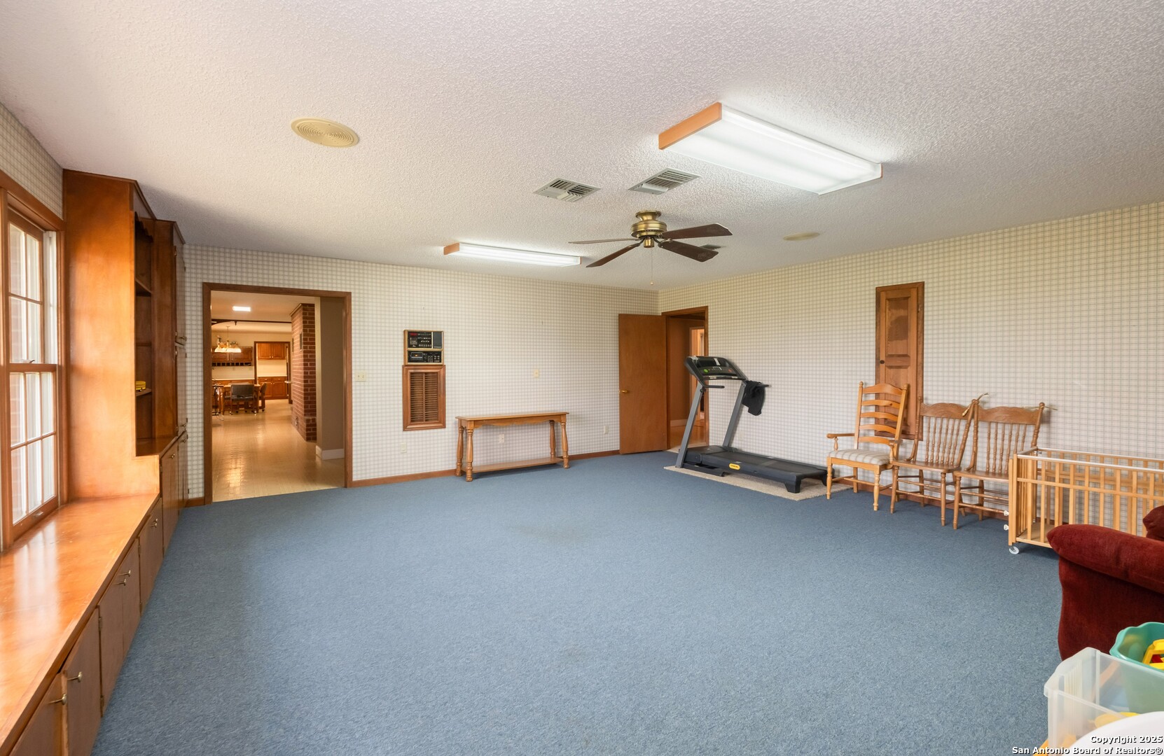 1221 Pieper Road New Braunfels, TX 78130 - Photo 6 of 43 a view of a livingroom with furniture and windows