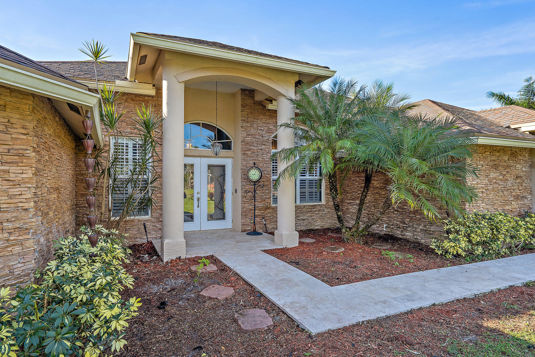 10344 154th Road North Jupiter, FL 33478 - Photo 8 of 50 Entry with sandstone pavers
