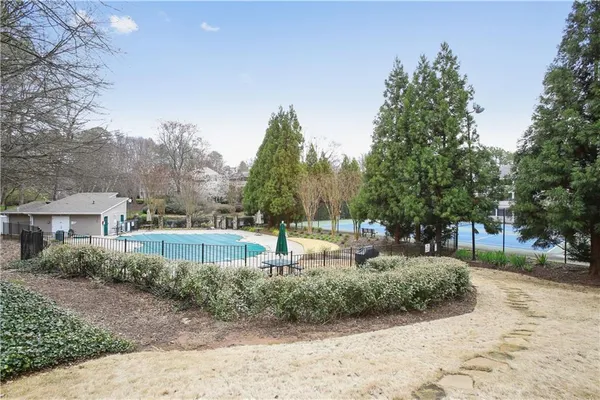 a view of backyard with green space