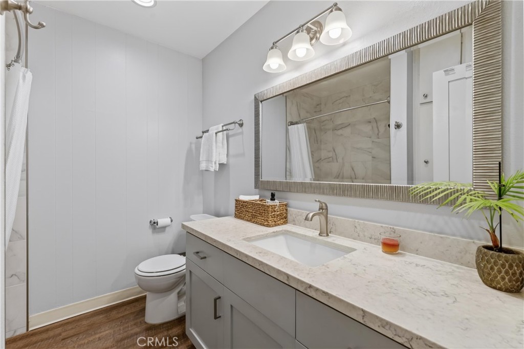 12200 Montecito Road, Unit B315 Seal Beach, CA 90740 - Photo 12 of 30 a bathroom with a sink and a mirror