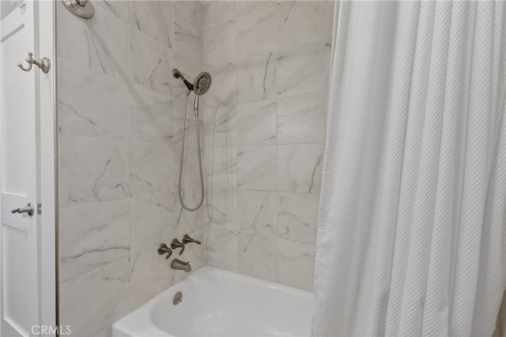 12200 Montecito Road, Unit B315 Seal Beach, CA 90740 - Photo 13 of 30 a bathroom with a bathtub