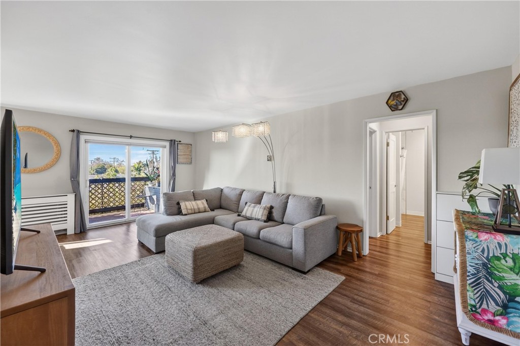 12200 Montecito Road, Unit B315 Seal Beach, CA 90740 - Photo 2 of 30 a living room with furniture and a window