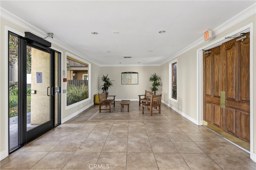 12200 Montecito Road, Unit B315 Seal Beach, CA 90740 - Photo 26 of 30 a view of dining room with furniture and floor to ceiling window