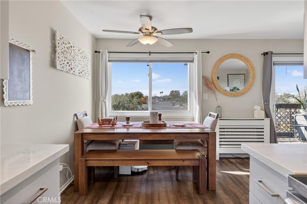 12200 Montecito Road, Unit B315 Seal Beach, CA 90740 - Photo 4 of 30 a room with a table chairs and a window
