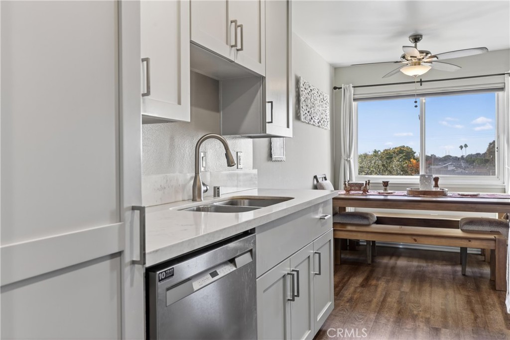 12200 Montecito Road, Unit B315 Seal Beach, CA 90740 - Photo 7 of 30 a kitchen with a sink and cabinets